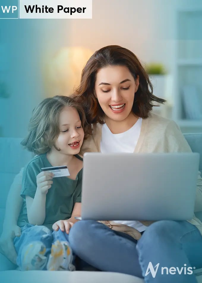 Mother and child looking at a laptop. The child is holding a credit card.